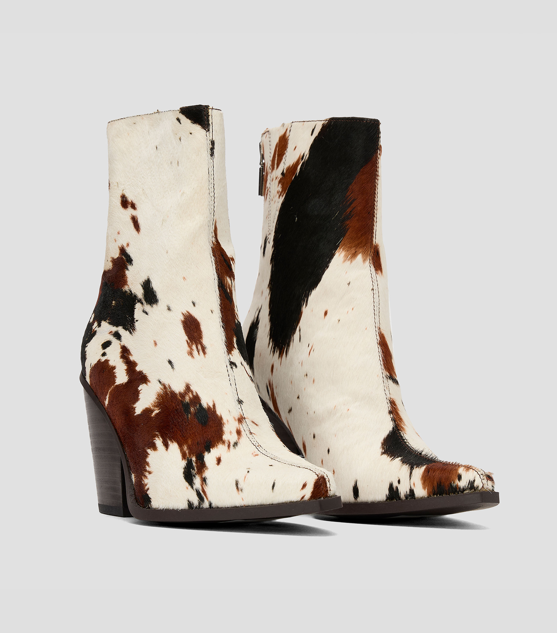 Botines vaqueros con tacón alto ancho con pelo de vaca Mujer
